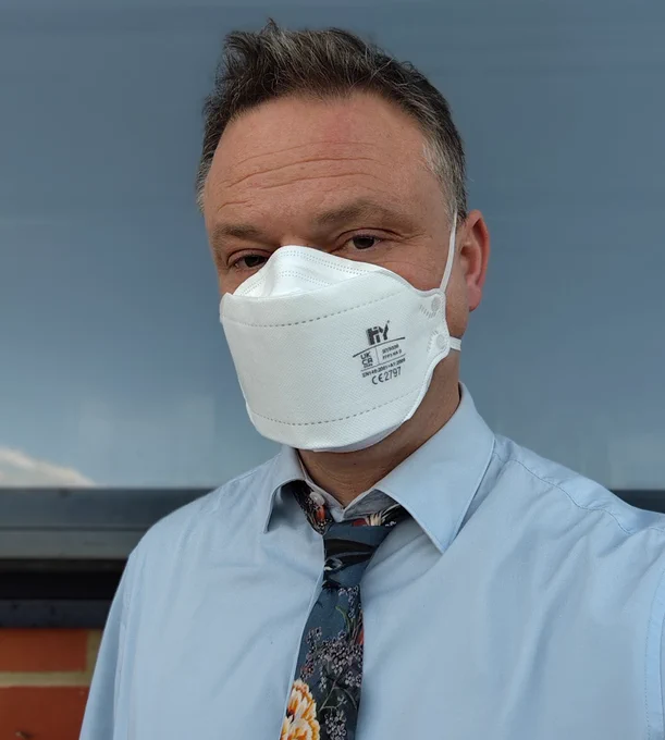 Teacher wearing FFP3 mask.