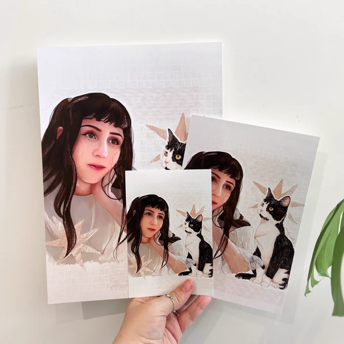 photograph of dodie prints held up in varous sizes