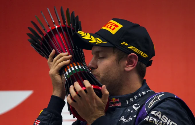 Seb kisses the trophy.