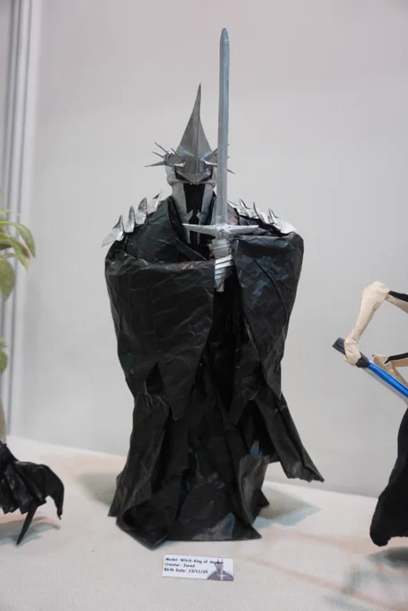 An origami of the Witch King of Angmar wielding a sword.