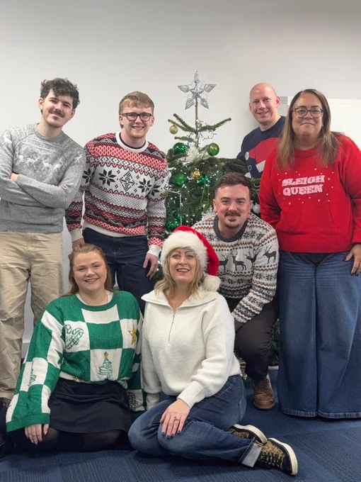 Close Brothers colleagues celebrating Christmas Jumper Day.