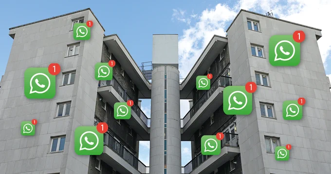 An estate block in Tower Hamlets with multiple WhatsApp logos