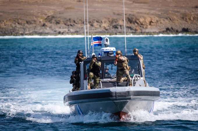 Coast Guard Tactical Law Enforcement Team Pacific members and Coast Guard Tactical Law Enforcement Team South members conduct joint exercises with Cabo Verde Marines and the Cabo Verde Coast Guard aboard the USS Bulkeley (DDG 84) in Cabo Verde, Africa, Mar. 21, 2023. The joint demonstration is part of the African Maritime Forces Summit. (U. S. Coast Guard photo by Petty Officer 1st Class Brandon Giles)