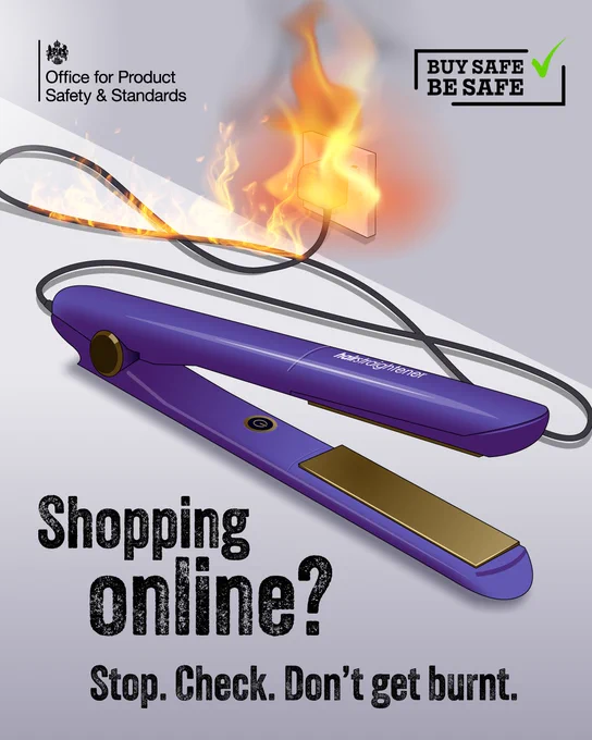 A purple hair straightener lies on the floor with its power cord plugged into a wall socket that is catching fire. Flames trail along the cable. The image includes the logos for the Office for Product Safety & Standards and the slogan “Buy Safe Be Safe.” Large text reads: “Shopping online? Stop. Check. Don’t get burnt.”