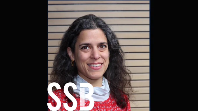 Devyani Sharma smiling with the Social Science Bites logo on the bottom