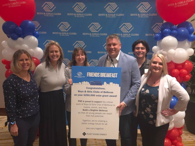 Boys and Girls Club of Bellevue and PSE staff pose for a photo at the Friends Breakfast