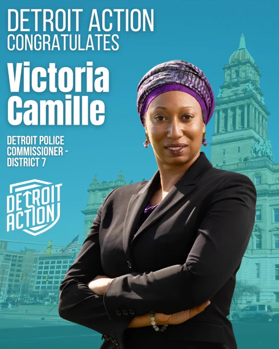 Detroit Action graphic with a blue tinted background image of Detroit City Hall and Administrative building.  A large image of Victoria Camille is on the right.

Text: Detroit Action congratulates Victoria Camille Detroit Police Commissioner District 7.