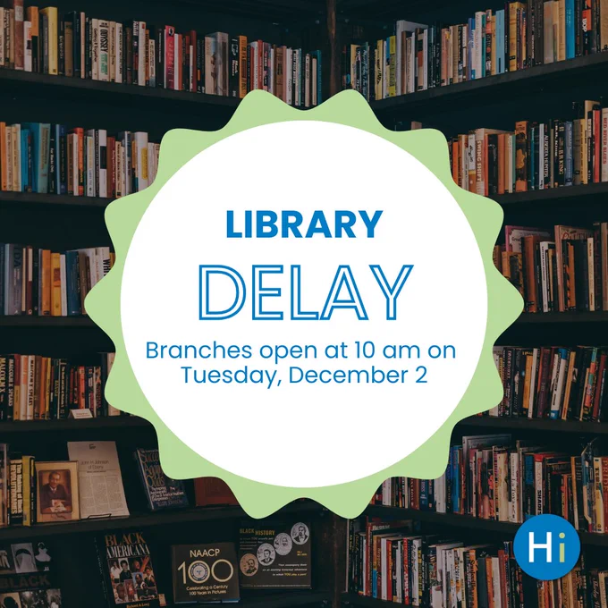 Announcement on a graphic that reads 'Library Delay - Branches open at 10 am on Tuesday, December 2' over a background image of bookshelves filled with various books.