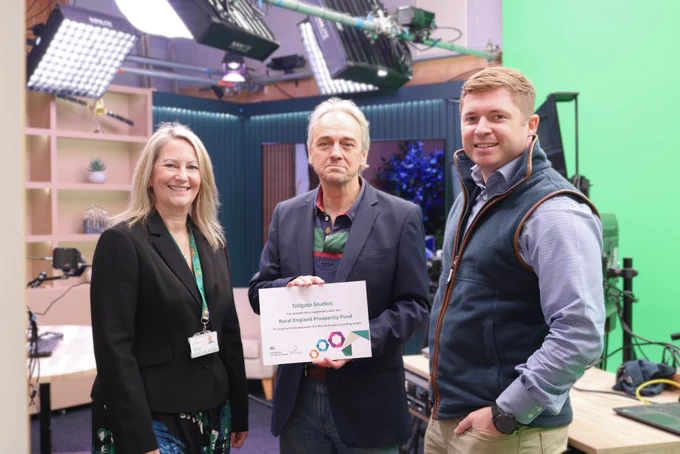 Cllr Sam Chapman-Allen, Leader of the Council, and Maxine O'Mahony, Chief Executive, presenting the certificate to Angus Scott.