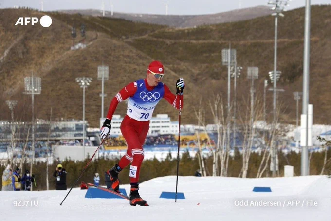 Russian skier Alexander Bolshunov competes in the men's 15km cross-country classic event during the Beijing 2022 Winter Olympic Games
