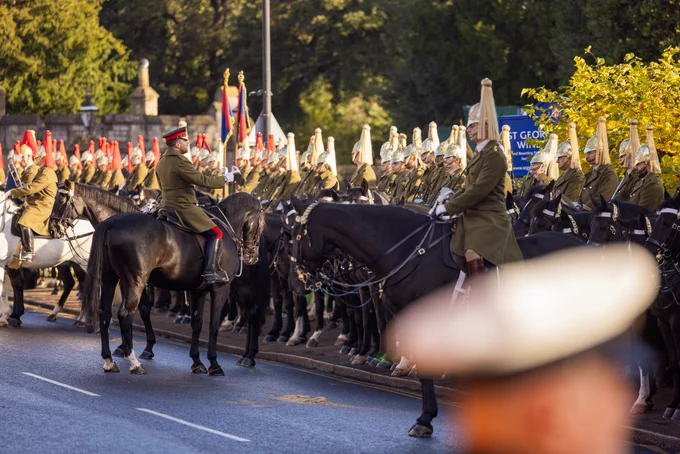 Cavalry troopers riding black horses line the street in Windsor as they practise the state welcome for Germany