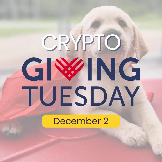 Text reads, “Crypto Giving Tuesday – December 2.” Watermarked in the background is an image of a five-week-old yellow Lab/golden retriever cross Seeing Eye puppy, Krypto, wearing a red Superman cape and lying on a red play set in the outdoor area of his suite at the Chester Campus.