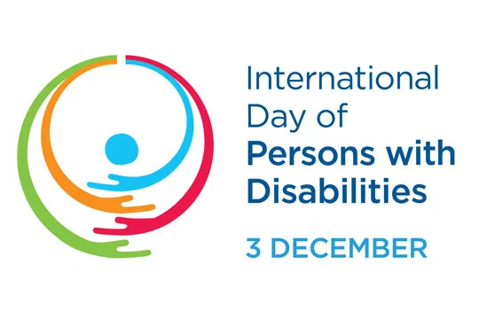 Logo for the International Day of Persons with Disabilities, showing four colored hands around a central figure and "3 DECEMBER."