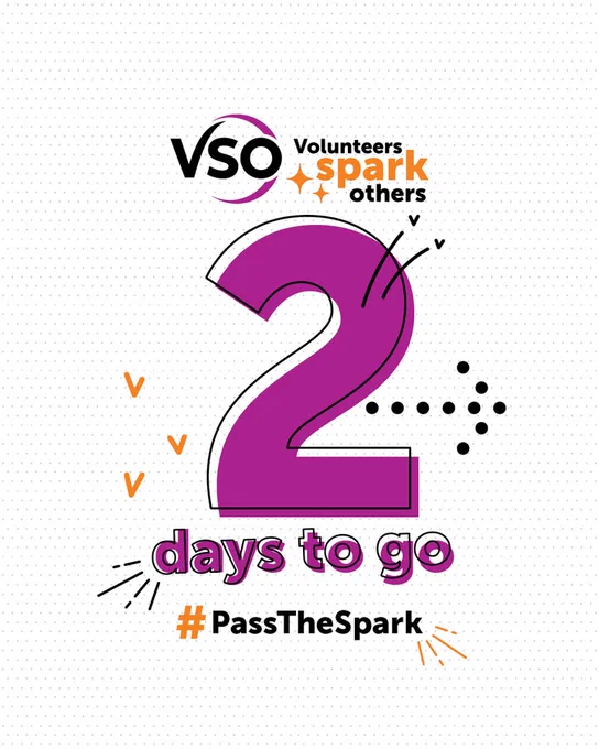 Graphic with a white dotted background featuring the VSO logo and the phrase “Volunteers Spark Others” beside it. Below, a large purple number “2” is centered with the text “days to go” in bold purple letters underneath. Decorative orange and black graphic elements surround the design. At the bottom, the hashtag #PassTheSpark is displayed in black and orange.