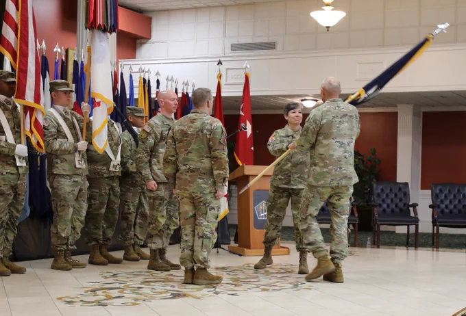 Chief of Staff of the Army, Gen. Randy A. George, receives the passing of the colors from Lt. Gen. Maria B. Barrett during the U.S. Army Cyber Command Change of Command December 3, 2025 at the Cyber Conference & Catering Center on Fort Gordon, GA.  The passing of the colors in the U.S. Army symbolizes the formal transfer of command, authority, and responsibility.