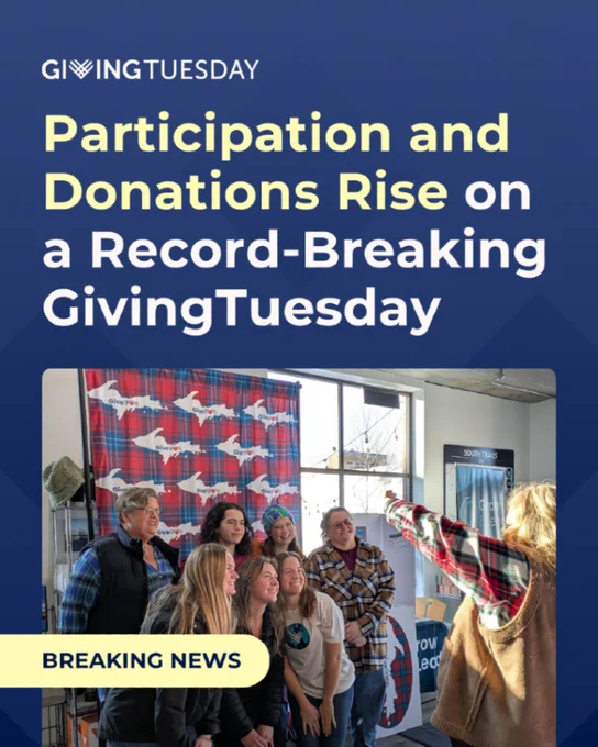 Group of people smiling as a photographer takes their picture, with text highlighting record-breaking participation and donations on GivingTuesday.