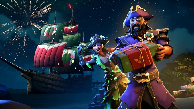 Two Sea of Thieves pirates stand on a beach in front of a Galleon with festive wreath sails. One pirate holds a gift wrapped in red and green, while the other poses behind them. Moonlight reflects off their clothes, while a pile of presents sits nearby.