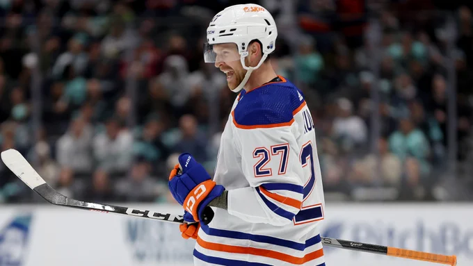 Brett Kulak celebrating a goal. 
