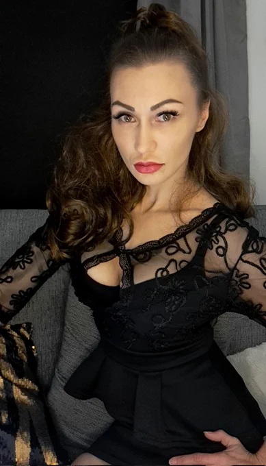 Elegance Finnish Femme Fatale in black dress