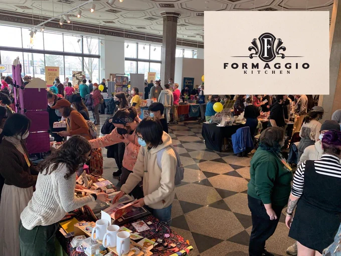 A photo of the MICE show floor with the Formaggio Kitchen logo in the corner.