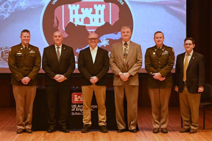 U.S. Army Corps of Engineers, Buffalo District leaders stand together with recently retired members of the district at a retirement ceremony in Buffalo, N.Y., Dec. 12, 2025. The district recognizes the positive impact, contributions to the nation, and long-standing commitment to public service of its retirees. (U.S. Army photo by Avery Schneider)