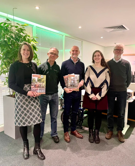 Ashley Wheaton, Chair of Cycling UK with four representatives of Camcycle at the Camcycle office