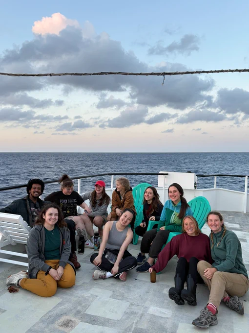Participants of the March 2025 C-CoMP cruise AE2504 sit together on the top of the R/V Atlantic Explorer. Photo shared by Ben Acosta. 