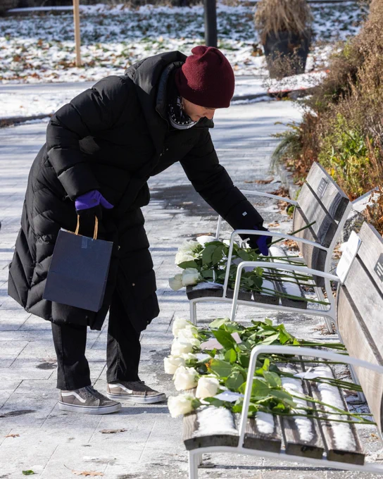 Community members placed roses to honour the lives of the 14 women killed at Montreal’s École Polytechnique in 1989.