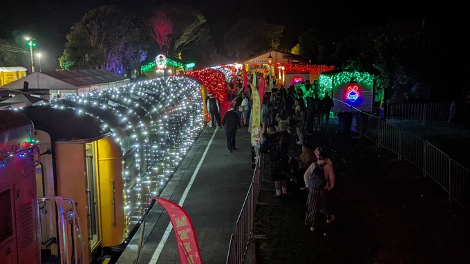 A train at Glenbrook station decorated in Christmas lights