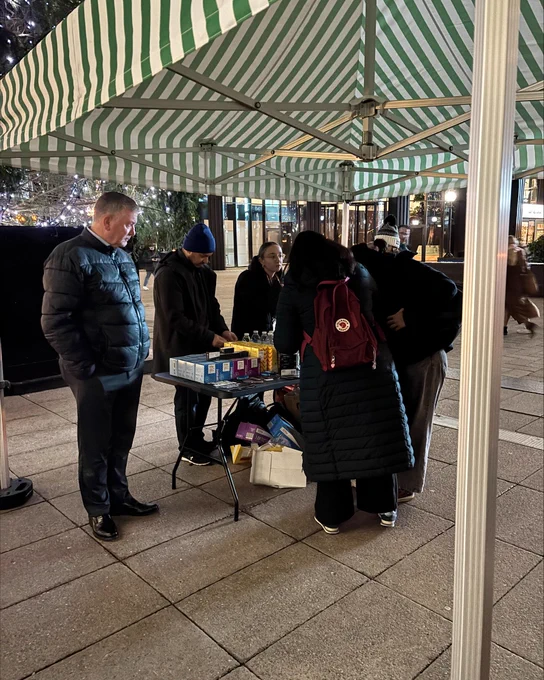 Teams chatting with the public at the Welfare pop up
