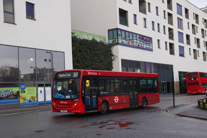 First Bus London DE20195 (YX11FZY) is a red Alexander Dennis Enviro200 and is pictured at Colindale, Superstores as it headed to Kingsbury Circle on route 303.