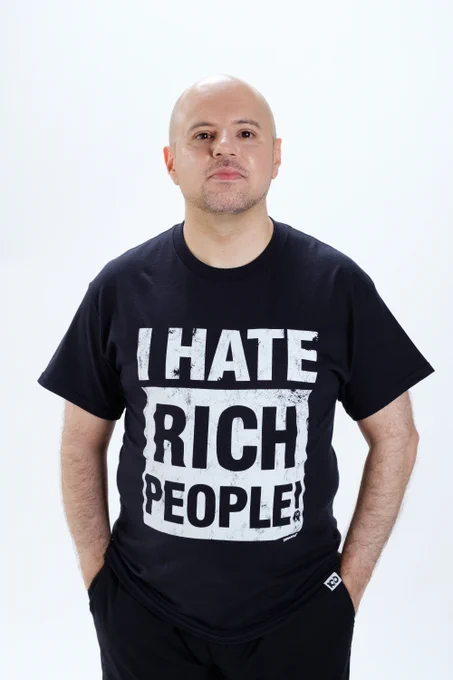 Spooky wearing our I HATE RICH PEOPLE t-shirt which has a tiny picture of Marshall Law in the bottom right corner so it counts as video games