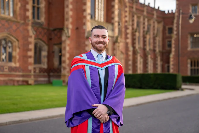 Dr Ryan Magee, graduating today. Pictured in front of the Lanyon building.