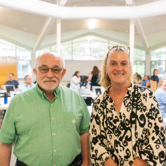 Two Marlborough School Committee members pose for a group photo in the Whitcomb Commons.