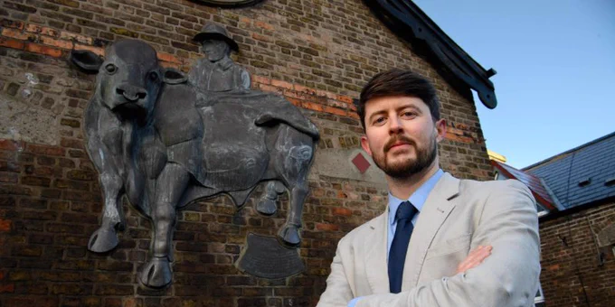 Dr Eugene Costello, UCC School of History and Radical Humanities Laboratory, awarded €2m European Research Council Consolidator Grant to explore commercial cattle farming. Dr Costello is pictured in front of The Bull and Drover, a sculpture by Kevin Holland, Madden's Buildings in Blackpool, Cork.