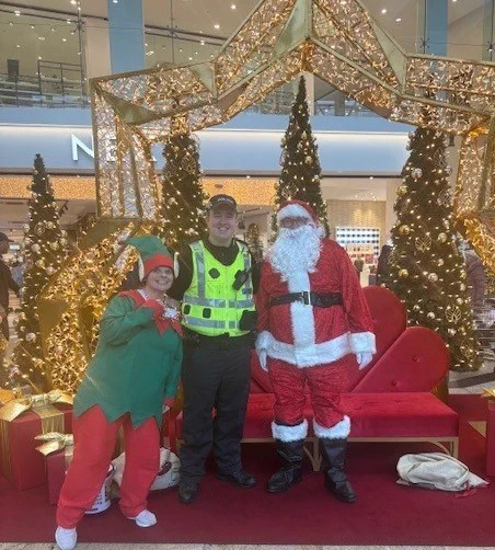 Police Officer in Hi-Viz standing with Santa