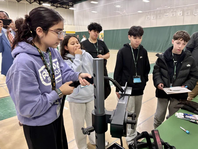 Students learning about training tools