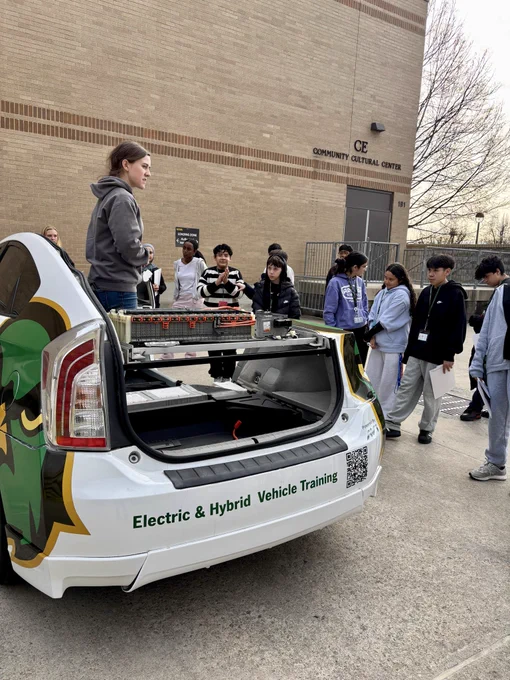 Students checking out electric and hybrid vehicle training