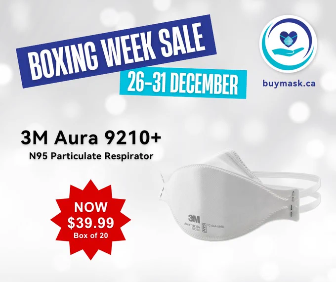 Photo of a white 3M Aura 9210  (white fabric headstrap). The background is light grey with some white bokeh. There’s a red gift tag with the following text: “Now $39.99, Box of 20”
“Boxing Week Sale - 26-31 December - buymask.ca”