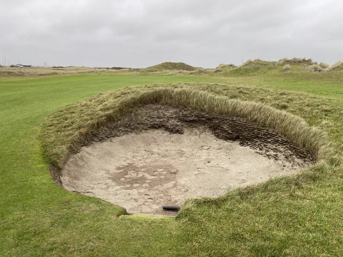 Before, the old pot bunker on the 8th fairway