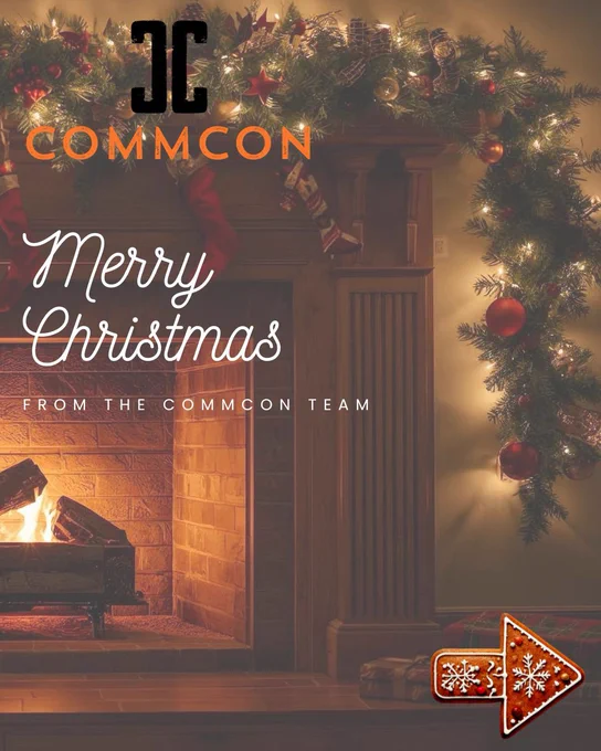 The CommCon logo sits in the top left-hand corner of the image. Below, text reads "Merry Christmas from the CommCon team". The image background is a cosy fireplace with festive garland. There is a gingerbread cookie arrow in the bottom right-hand corner pointing to the next image.