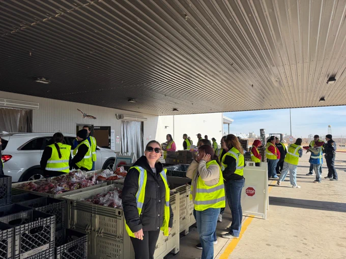 TTP team members volunteer at the South Plains Food Bank. 