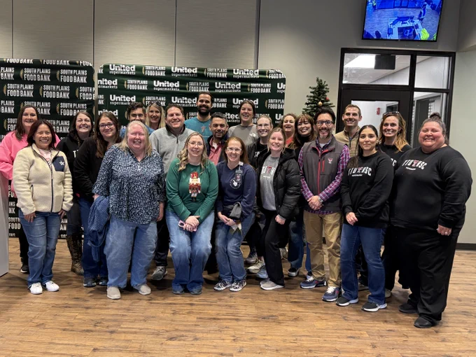 TTP team members volunteer at the South Plains Food Bank. 