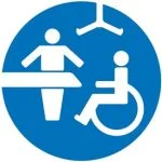 Accessible changing facility symbol showing a person, a wheelchair user, an adult changing table, and an overhead hoist.