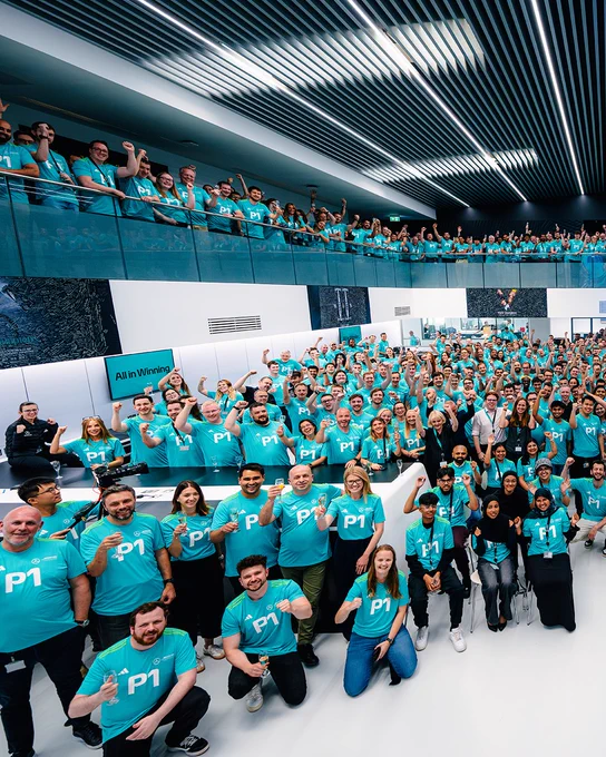 A split image of the factory in Brackley celebrating the Canada victory
