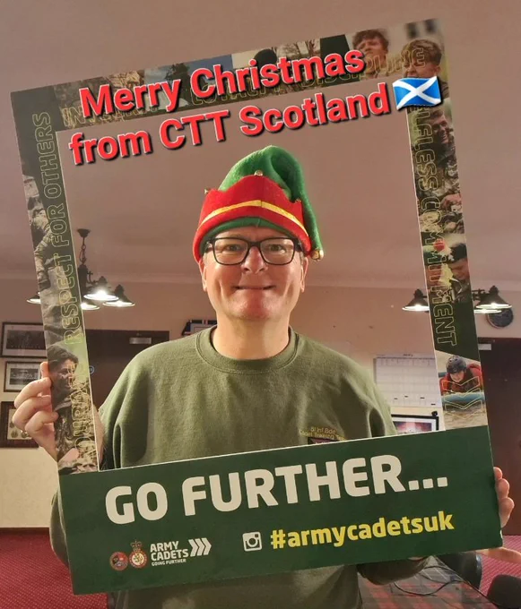 OC CTT holding Go Further card. 