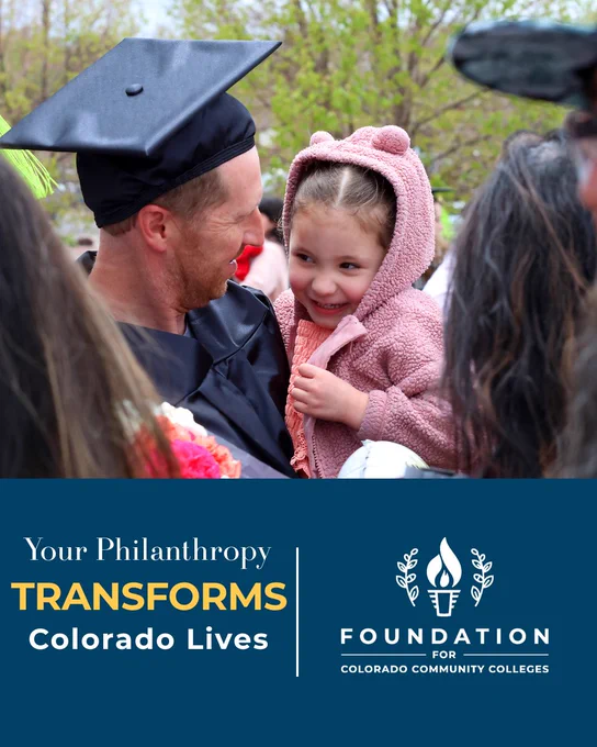 Graduate in black cap and gown holds a child in a pink hooded jacket during an outdoor celebration. A blue banner at the bottom reads: “Your Philanthropy Transforms Colorado Lives” with the Foundation for Colorado Community Colleges logo.
