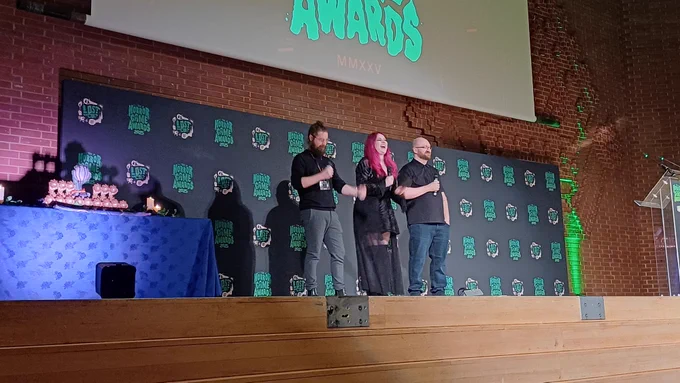 Phil Dickens, Ash Millman and Will Penkeyman on stage at The Horror Game Awards 2025