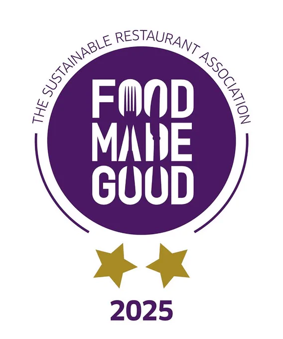 The Sustainable Restaurant Association Food Made Good award logo with 2 stars and the year '2025' displayed