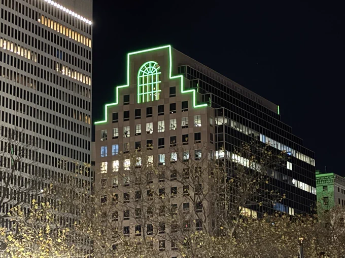 A building in downtown Providence is lit green for Injury Prevention Day.